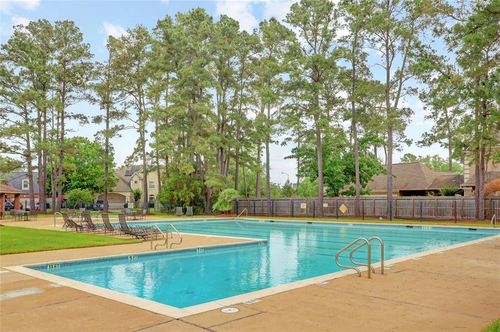 One of the many amenities include a spacious outdoor pool and clubhouse.