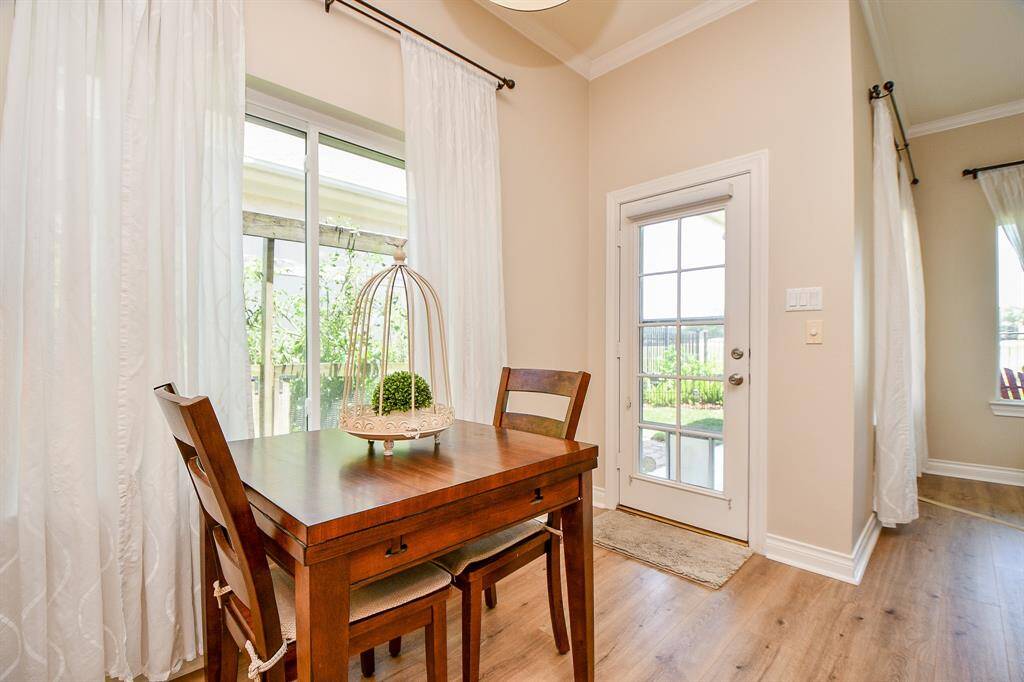 Charming breakfast area with view of vegetable gardens.