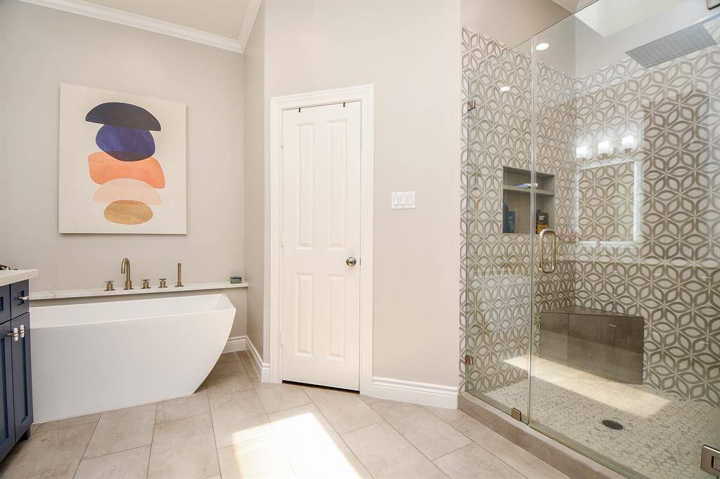 Separate beautiful shower and soaking bathtub.