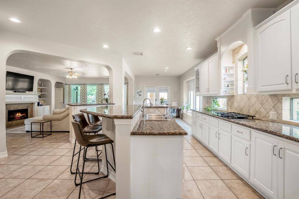In home dining is easy in the home, with several options, here you family get to participate in family time at the breakfast bar.