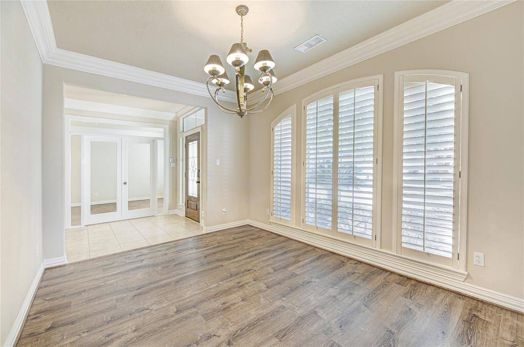 Formal dining room, to the left upon entry.
