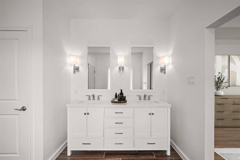 Freestanding vanity with dual sinks in primary bath (*Photo not of actual home and used for illustration purposes only.)