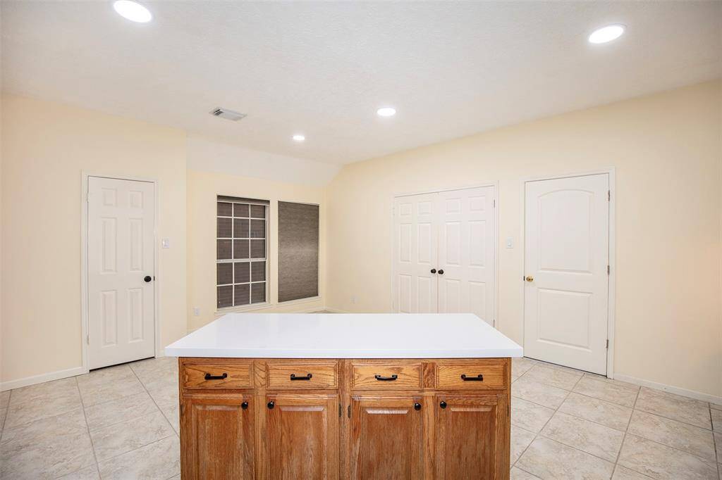 The large island is a great space for meal prep.