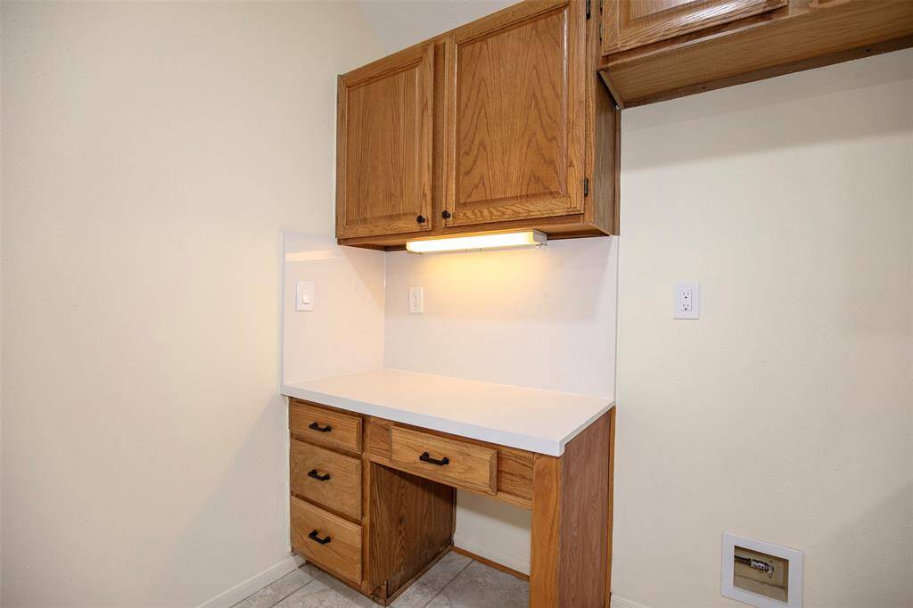 A built-in planning area provides a convenient spot for organizing your day.