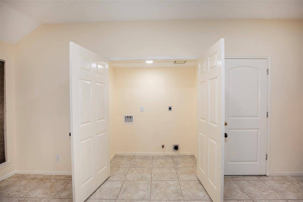 The utility closet has the perfect spot.  Conveniently located between the primary and secondary bedrooms.