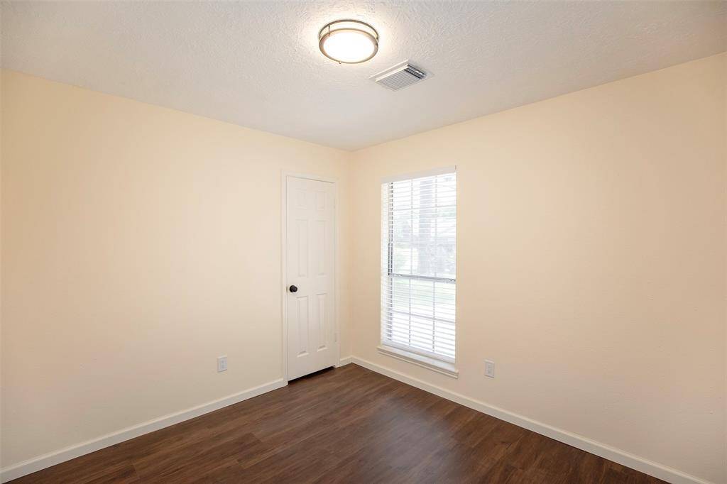The first of two secondary bedrooms.