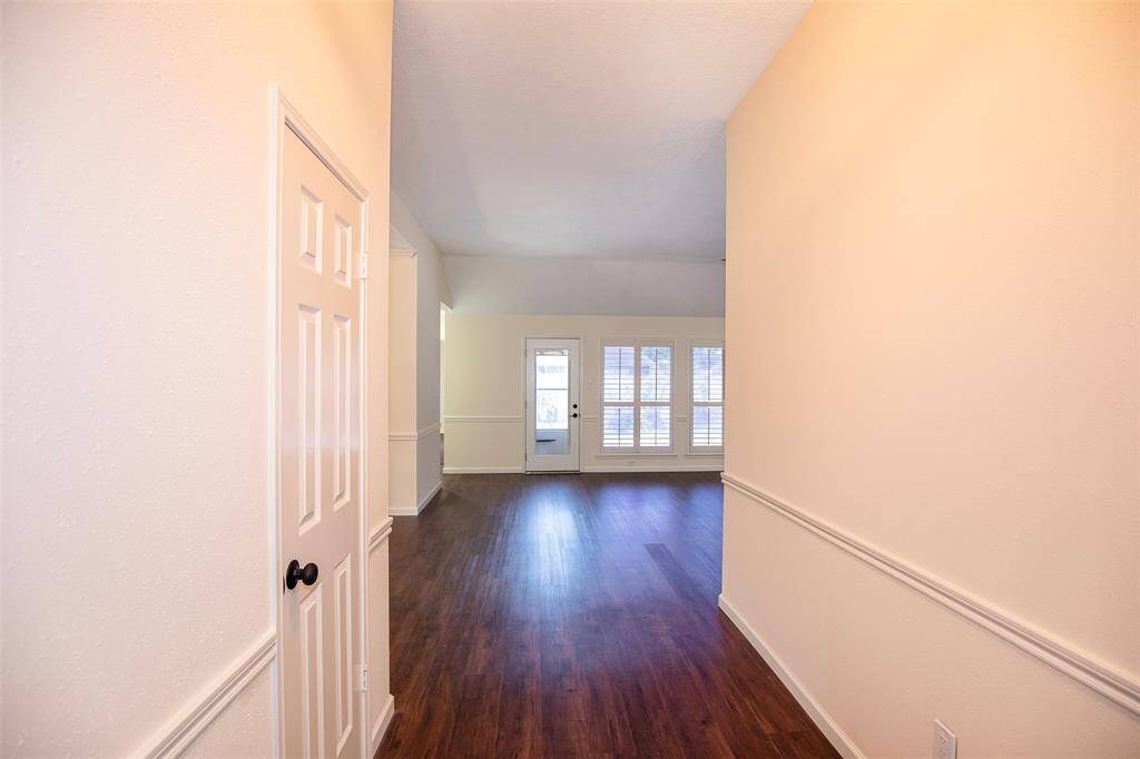 A view of the entryway looking to the family room.