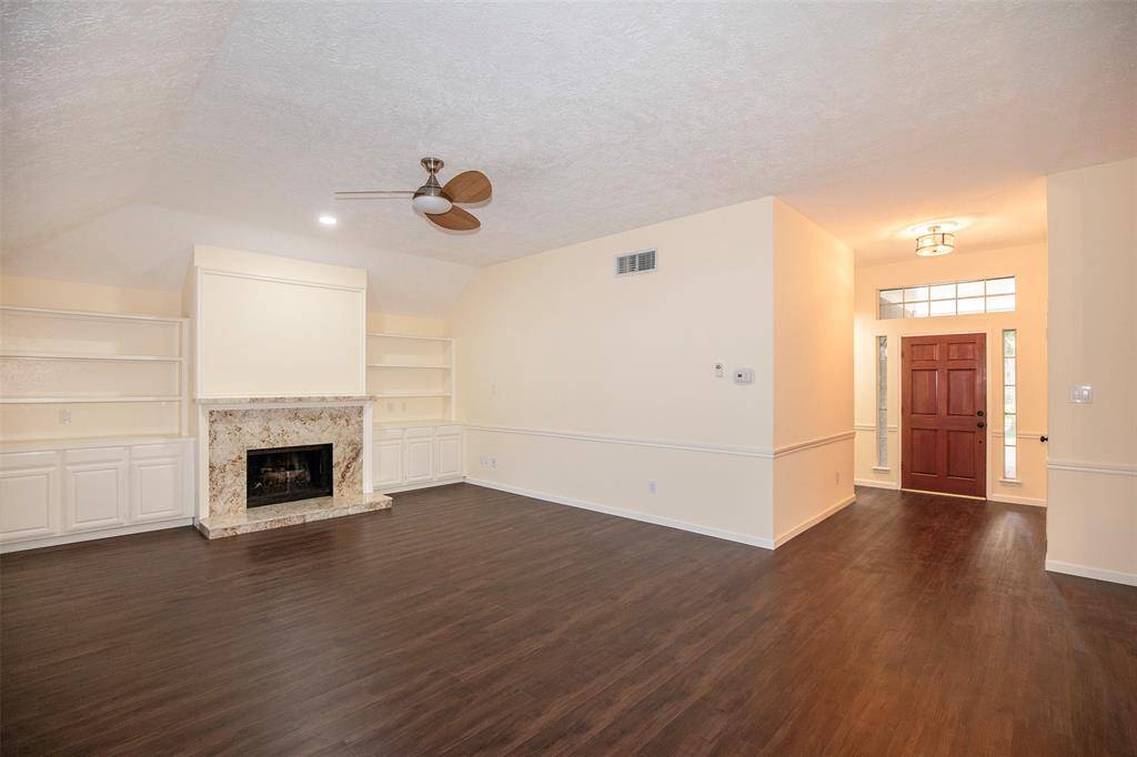 From this view of the family room, you can see to the entryway.