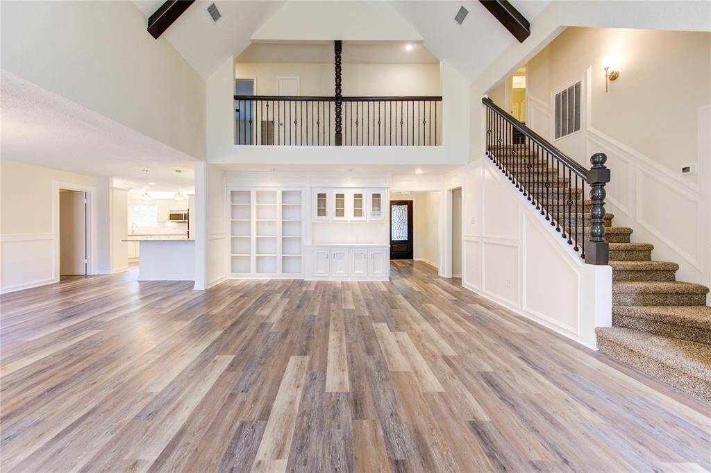 Updates include all new iron balusters and all new flooring.  There are very nice built-in's too in this family room.