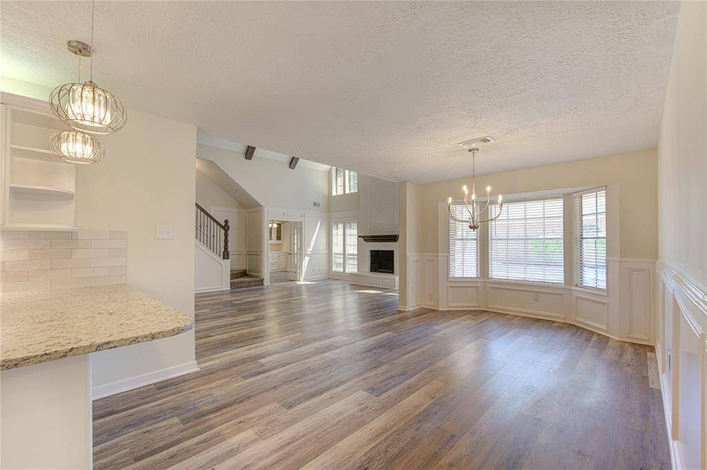 View of bar stool area and breakfast room.