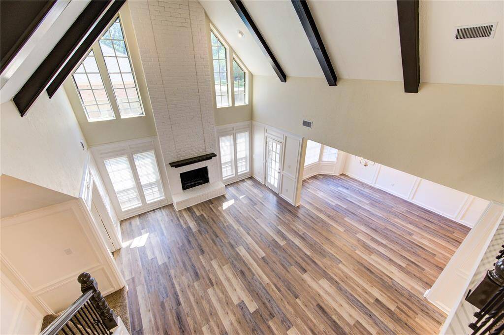 The family room is open to the second floor for that dramatic, impressive look.