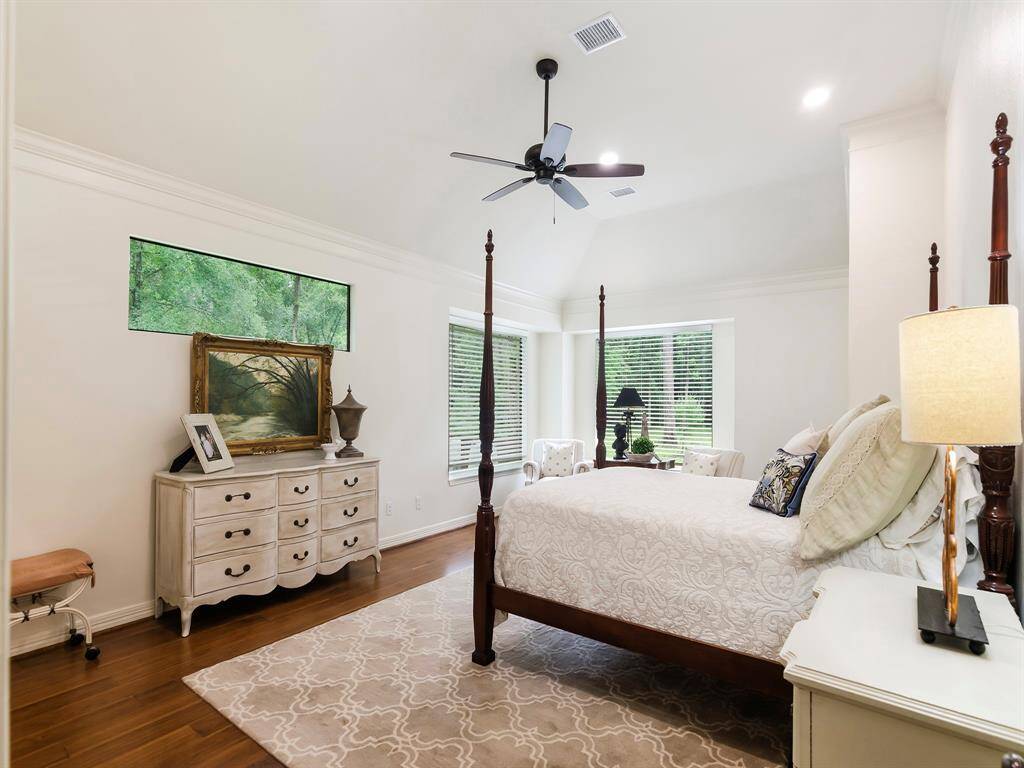 The owner's suite offers a peaceful retreat with a spacious layout and tranquil ambiance, perfect for unwinding at the end of the day.