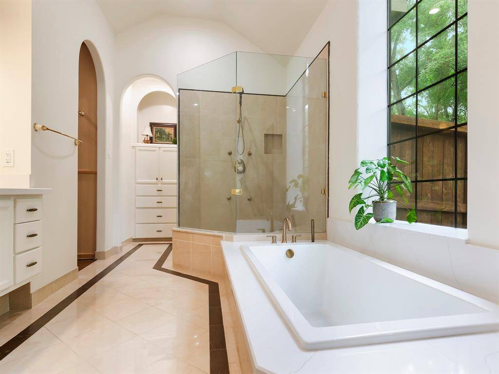 This photo frame reveals the entrance to the customized spacious walk-in closet.