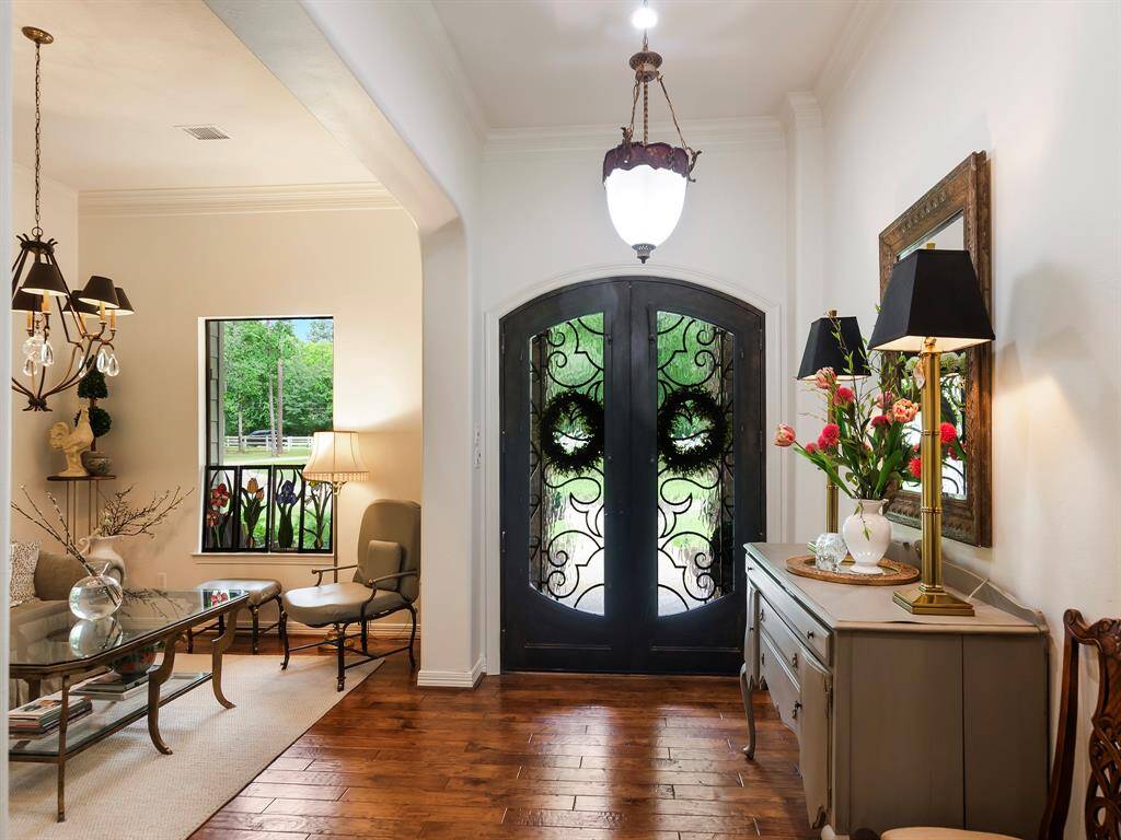 A elegant formal foyer sets the tone with elegant proportions, refined details and a warm, welcoming presence.
