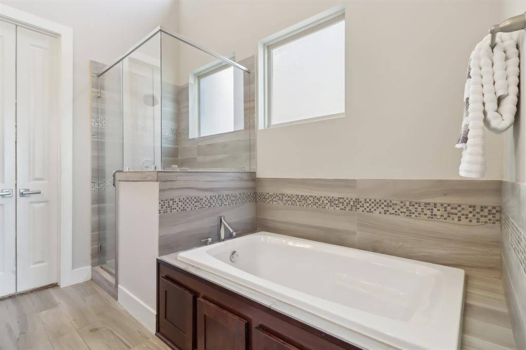 Relax in the soaking tub or separate shower