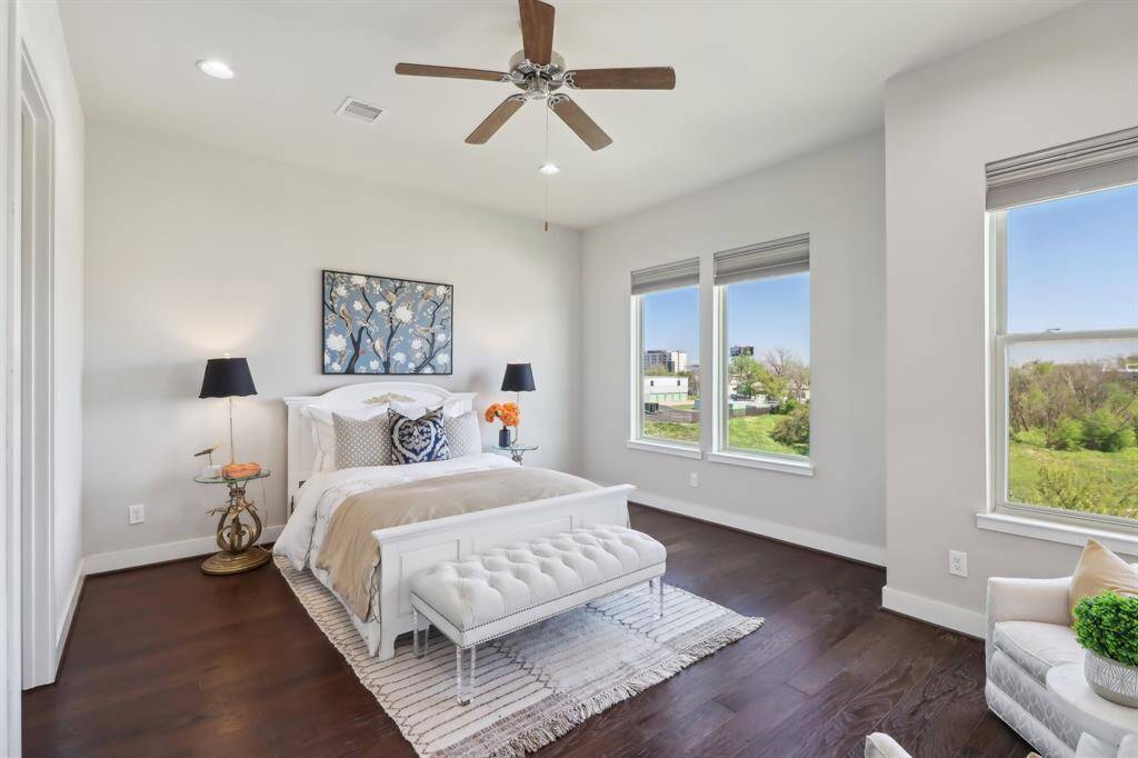 Spacious primary suite with wonderful views of the trails. Provide privacy with plenty of sunshine.