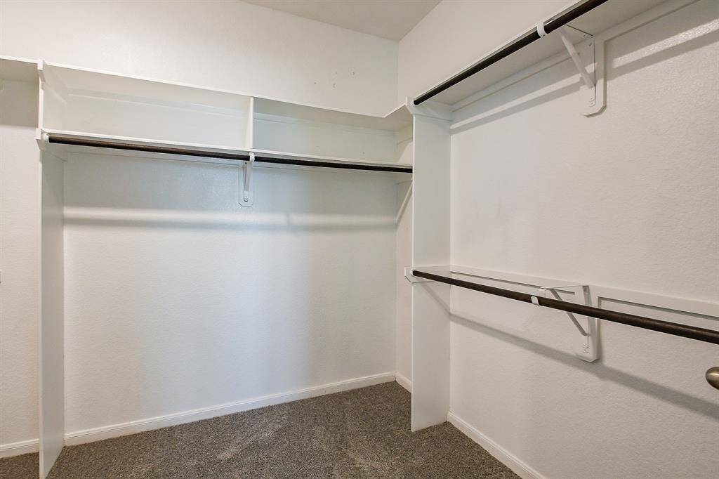 Spotless and bright, the primary ensuite bath is roomy as it caters to all creature comforts. Straight ahead, is an amazing walk-in closet.