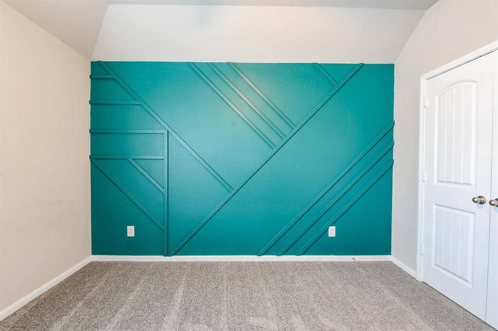 The huge, carpeted primary walk-in closet will store and organize just about everything you own in one place.