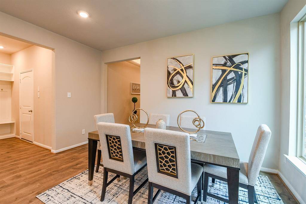 This front floor view, from entry all the way back to living/kitchen and dining areas, is nothing less than magazine worthy!