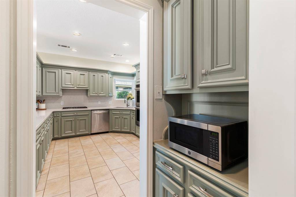 The butler’s pantry offers added storage and convenience!