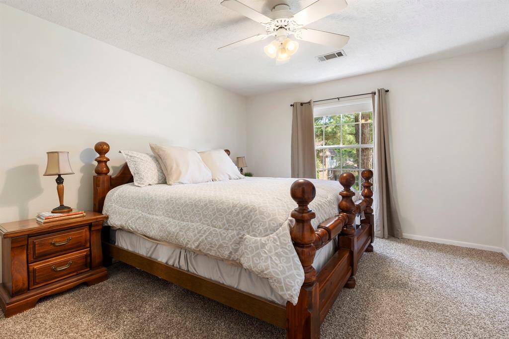Secondary bedroom #3 is exceptionally spacious (15x13)—large enough to comfortably fit a king-size bed. A private full bath is adjacent to this room, making this room the ideal guest bedroom.