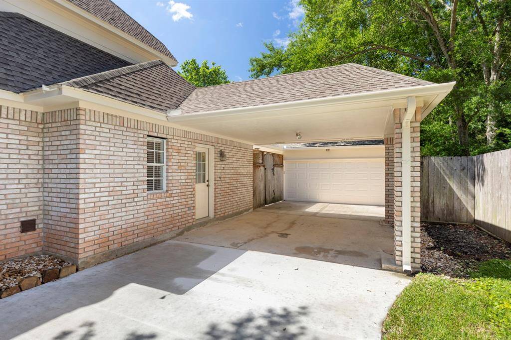 Laundry room with storage cabinets and room for a second refrigerator