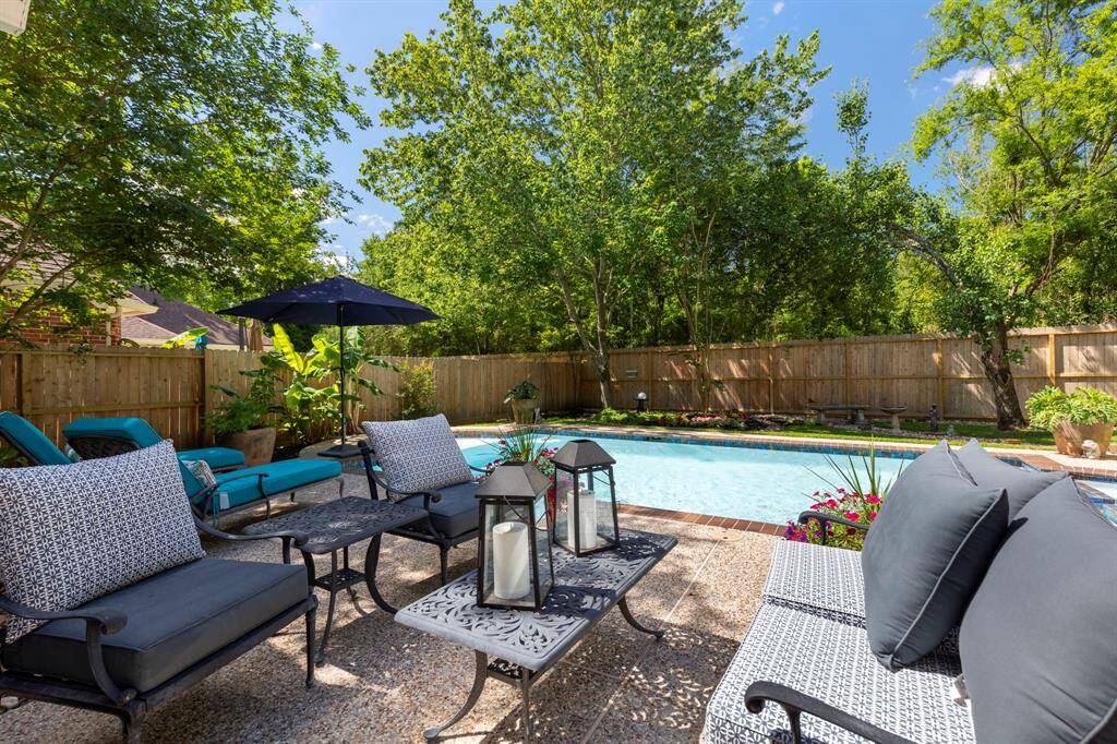 With a new fence on three sides, and an 8 foot fence along the back, the backyard is private—an ideal space for birdwatching, unwinding, or simply enjoying the serene atmosphere.