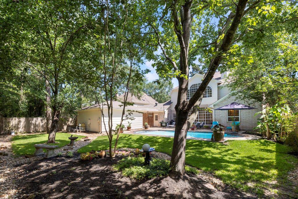 Mature trees offer natural shade, creating a peaceful, park-like setting.