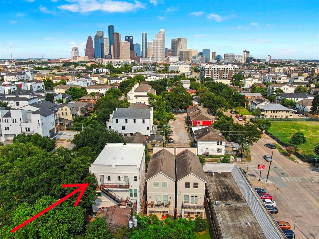 Aerial view showing back of property looking towards Downtown