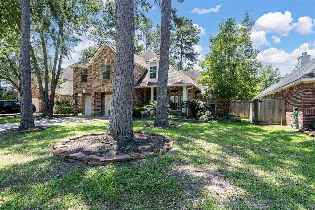 Nestled on great tree filled lot.