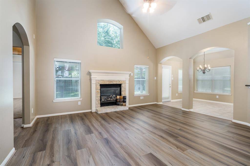 Spacious family room with high ceilings