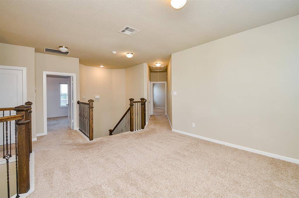 The open layout makes it easy to stay connected with the rest of the upstairs space.