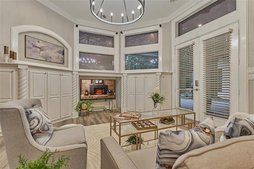 Gourmet kitchen with new cooktop, custom cabinetry, and premium stainless steel appliances