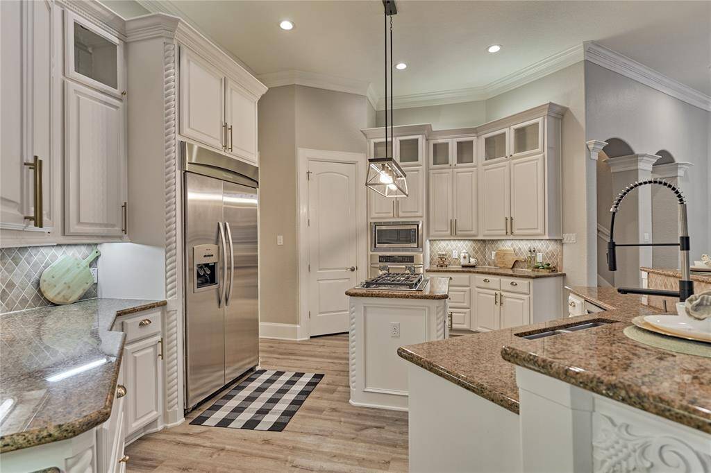 Laundry room featuring an additional sink, gas hook-up, and flexibility for electric or gas dryer.