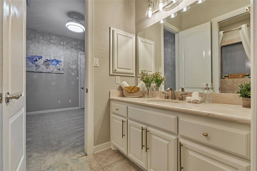 3rd bedroom near the back entrance, conveniently adjacent to a full bath and outdoor kitchen.