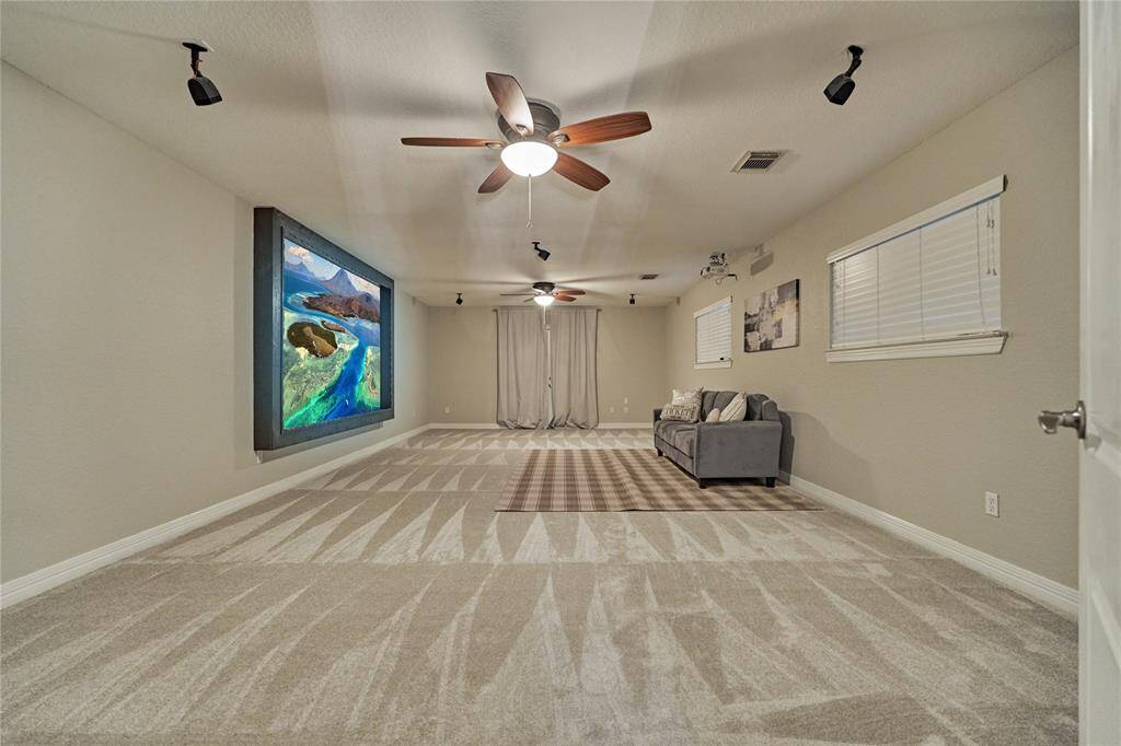 Expansive outdoor space accessible from the formal sitting area, perfect for entertaining.