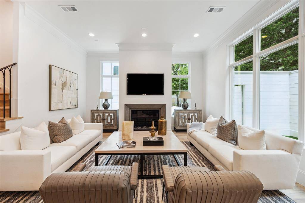 Welcome to 16 Wentworth Square! Step into luxury with the spacious Balmoral floorplan, featuring 4-5 bedrooms, 4 bathrooms, 2 powder baths, and approximately 3,698 square feet of living space. This elegant home sits on a corner lot, offering not only a sense of privacy but also ample natural light and room to enjoy outdoor living.