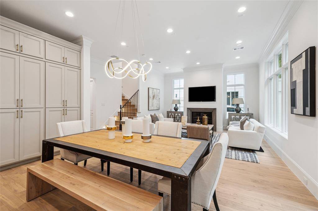 Dining space is located directly off of the living. Ample windows and a set of french doors fill this space with light.