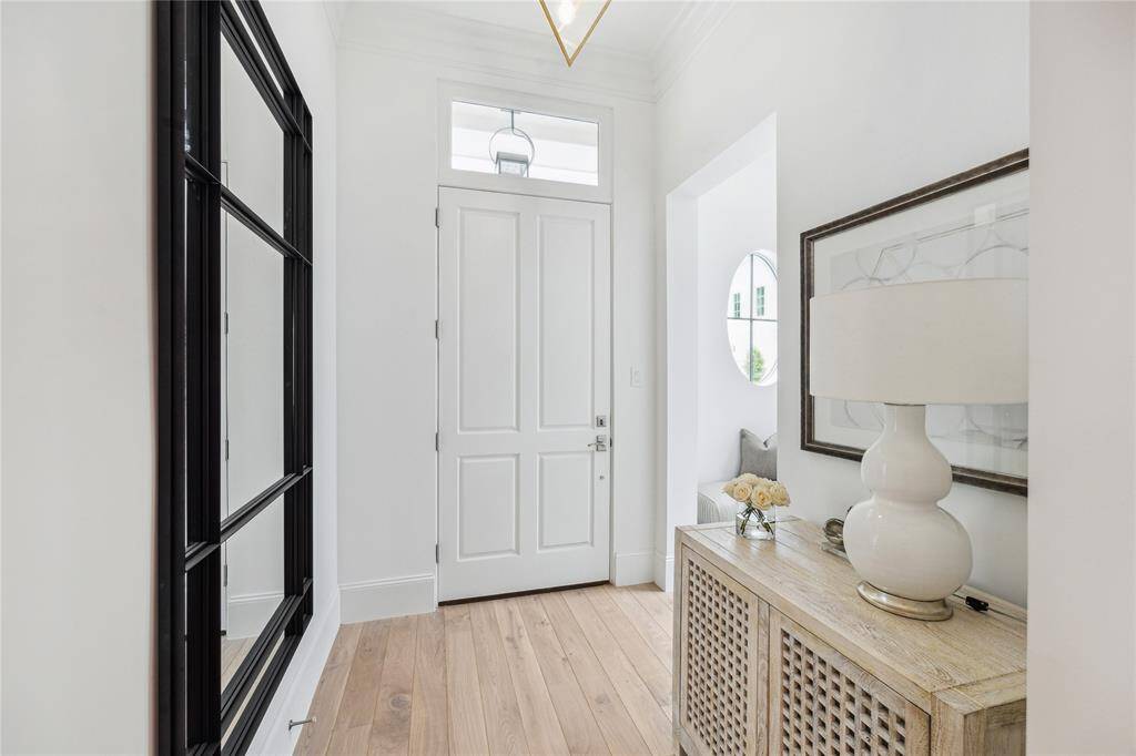 The home is equipped with a Lennox 5-ton zoned HVAC system, two Navien tankless water heaters with a circulating pump and insulated hot water distribution throughout for convenience and modern living.