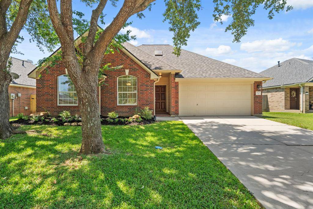 Charming & inviting exterior in Waterside Estates.