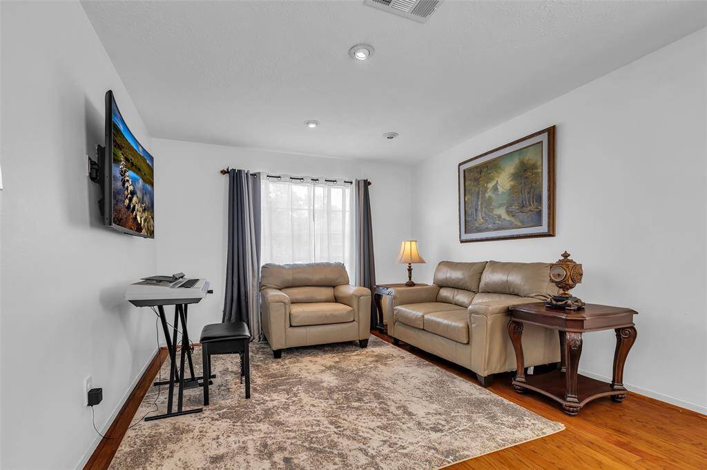 Bright and clean family room in the front of the home.