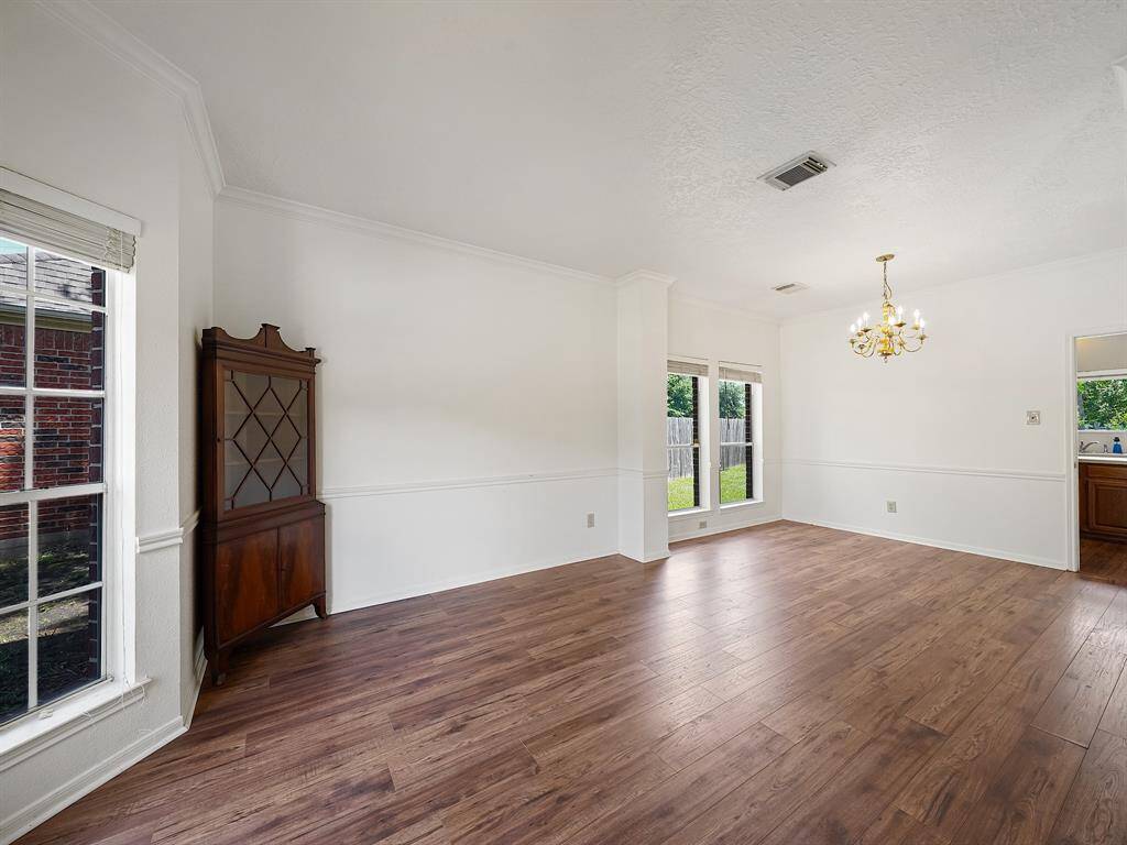 Family room/sitting area looking into the dining room.
