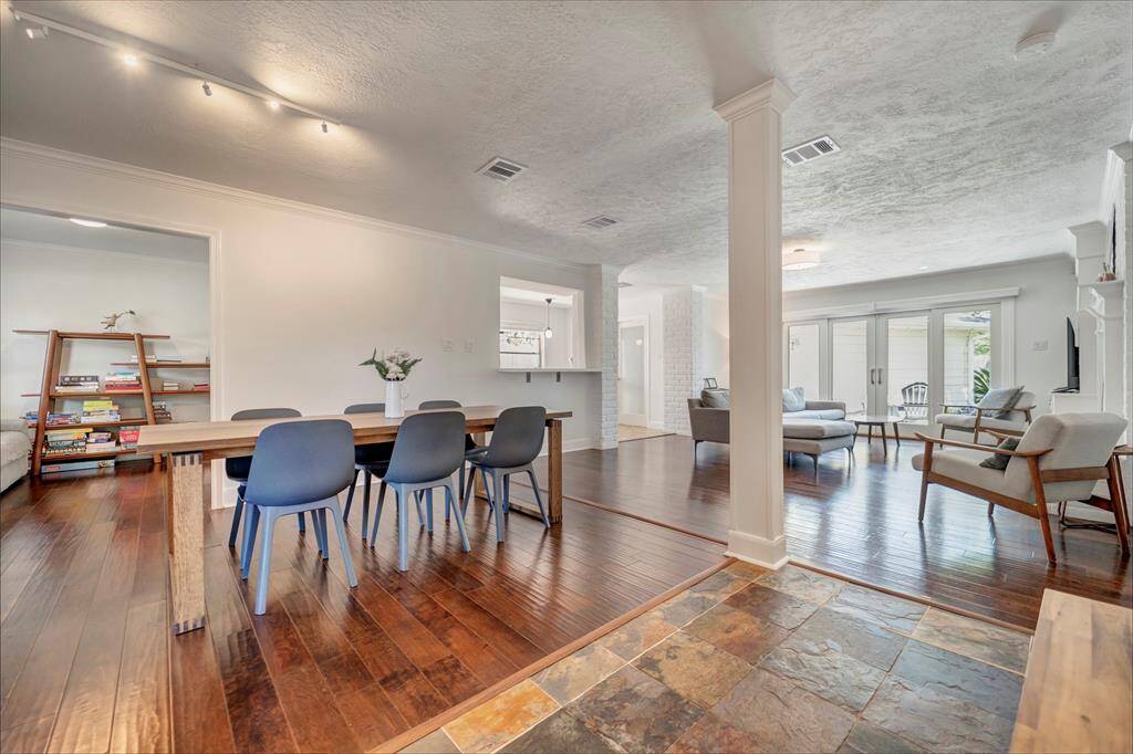 Immediately upon entering, you are greeted by gorgeous slate flooring that is sure to impress your guests! Right off the bat you can tell that this home has a truly open floorplan.