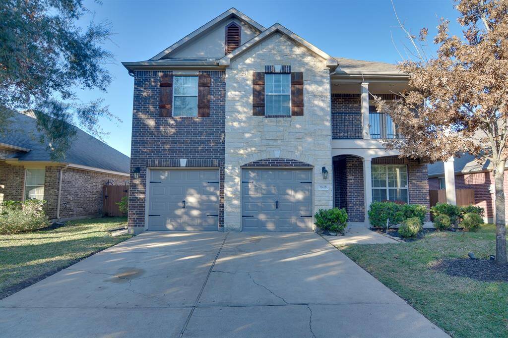 Welcome home to 17410 Sandalisle Lane located in Aliana and zoned to Fort Bend ISD! This stunning home has lovely curb appeal, a well-manicured lawn, beautiful landscaping, brick and stone elevation, dark stained front door with glass detailing, covered front porch, traditional style, beautiful outdoor lanterns and a double wide driveway!
