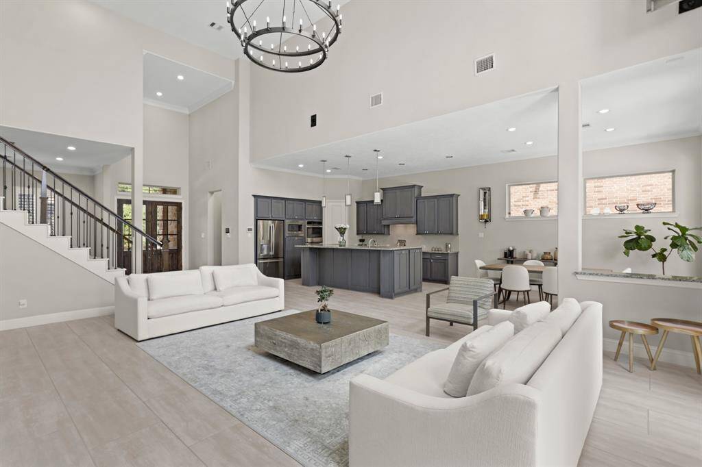 A view of the open layout with stunning high ceilings.