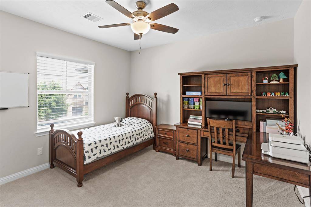 Secondary bedroom located upstairs.