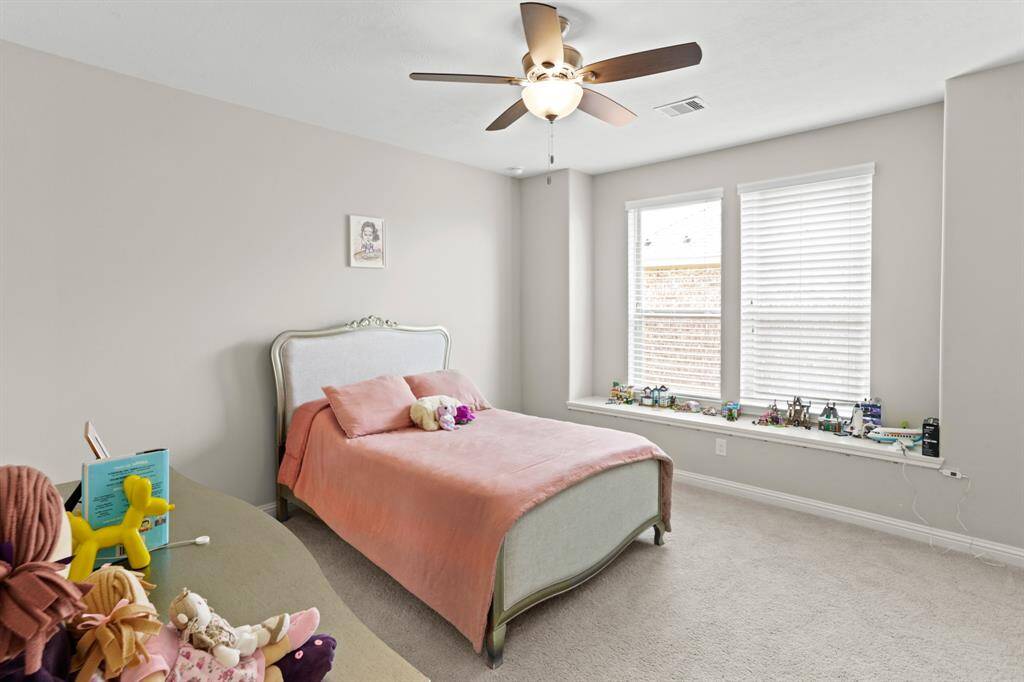 Secondary bedroom located upstairs.