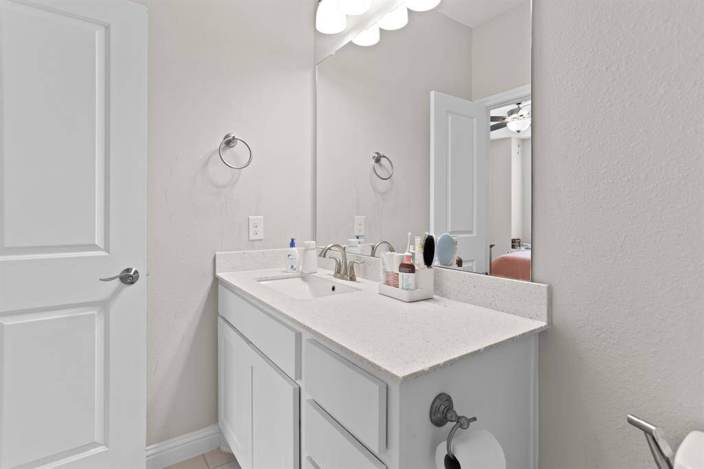 Secondary bedroom has it's own vanity.