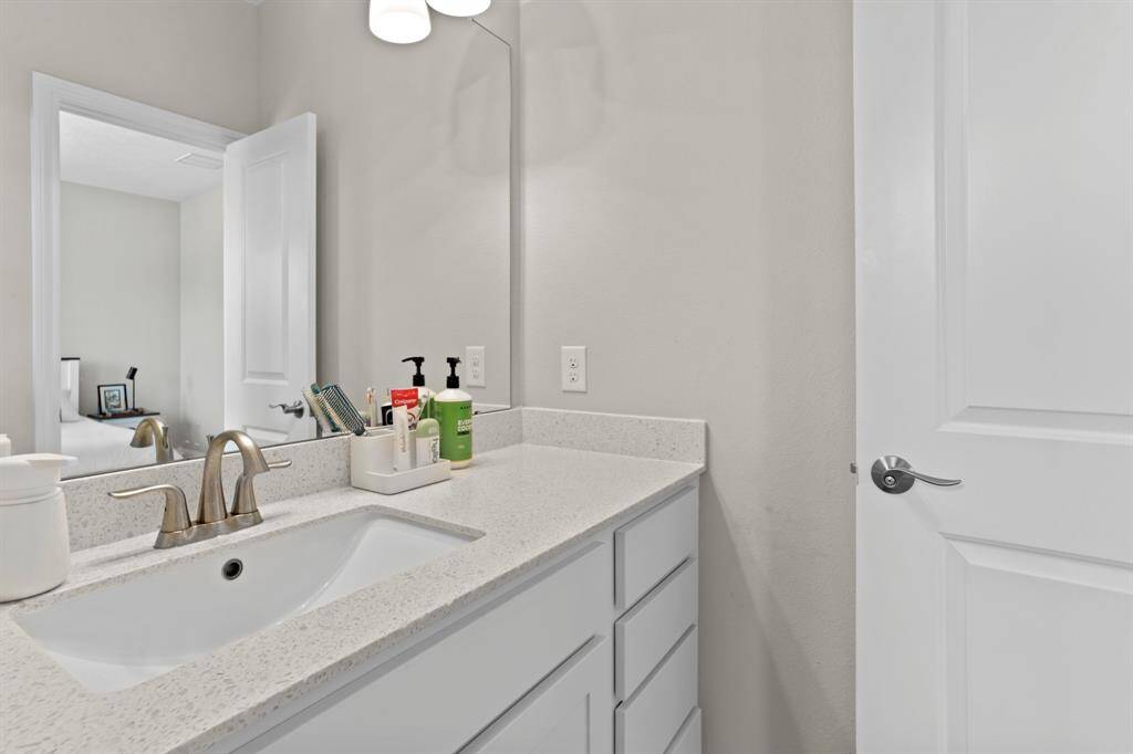 Secondary bathroom located upstairs.