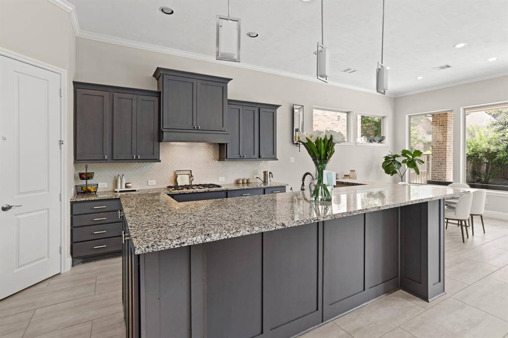 Stunning kitchen open to the living room and breakfast area.